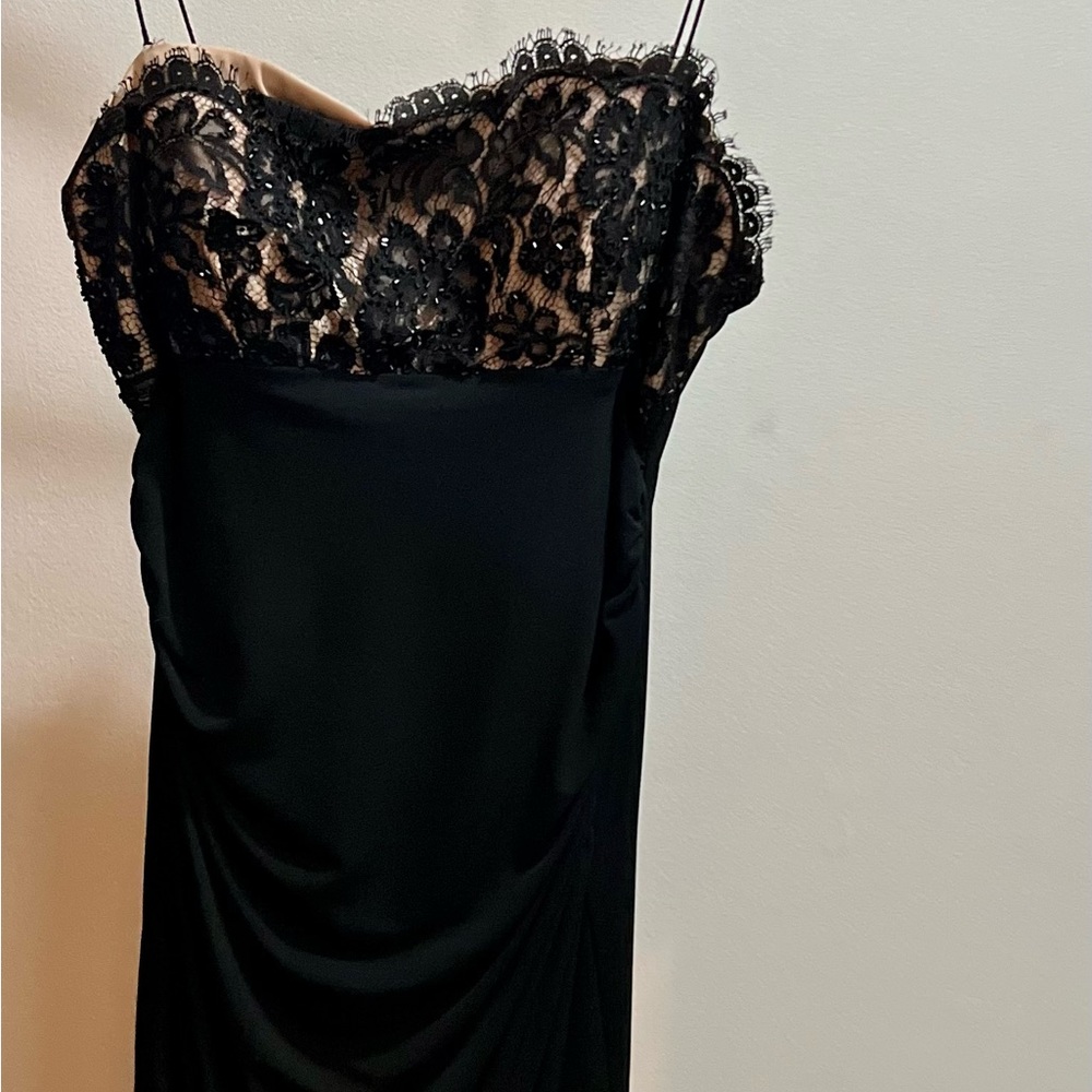 Beautiful black cocktail dress lace on top perfect condition..